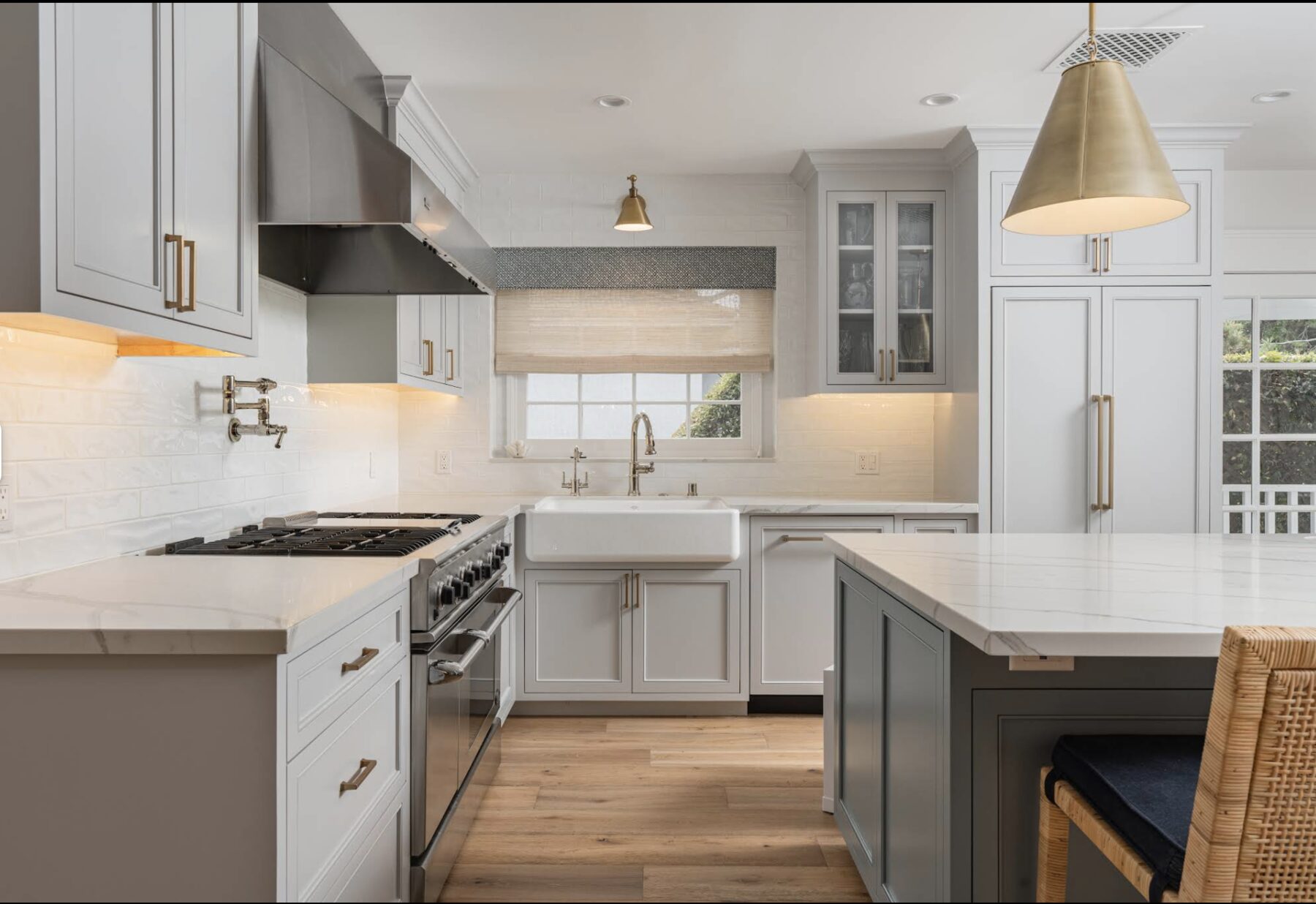 A Clear Construction kitchen remodel with gray cabinetry and brass fixtures